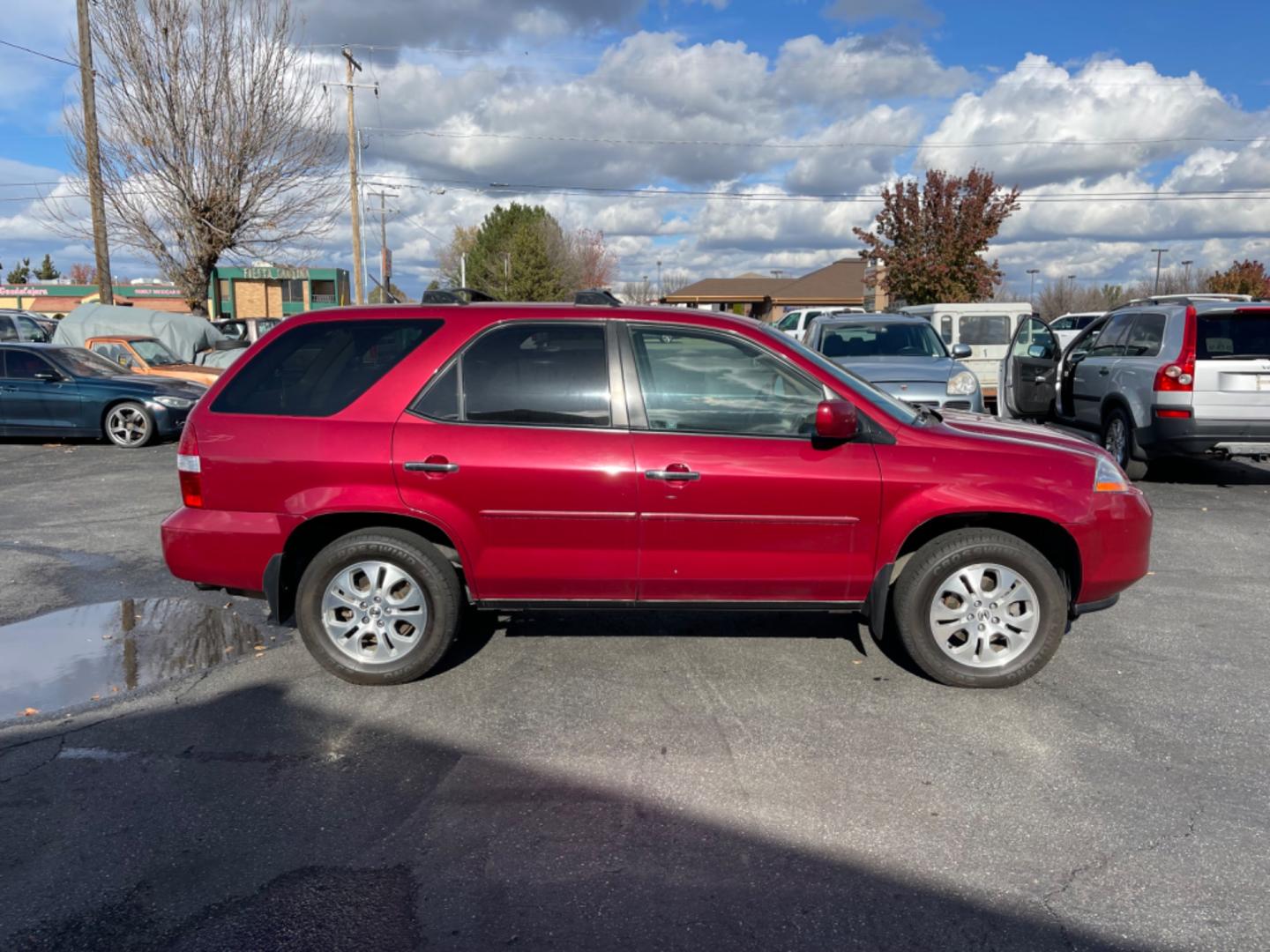 2003 Maroon /Tan Acura MDX Touring (2HNYD18923H) with an 3.5 V6 engine, AT transmission, located at 813 E Fairview Ave, Meridian , ID, 83642, (208) 336-8230, 43.618851, -116.384010 - Photo#4